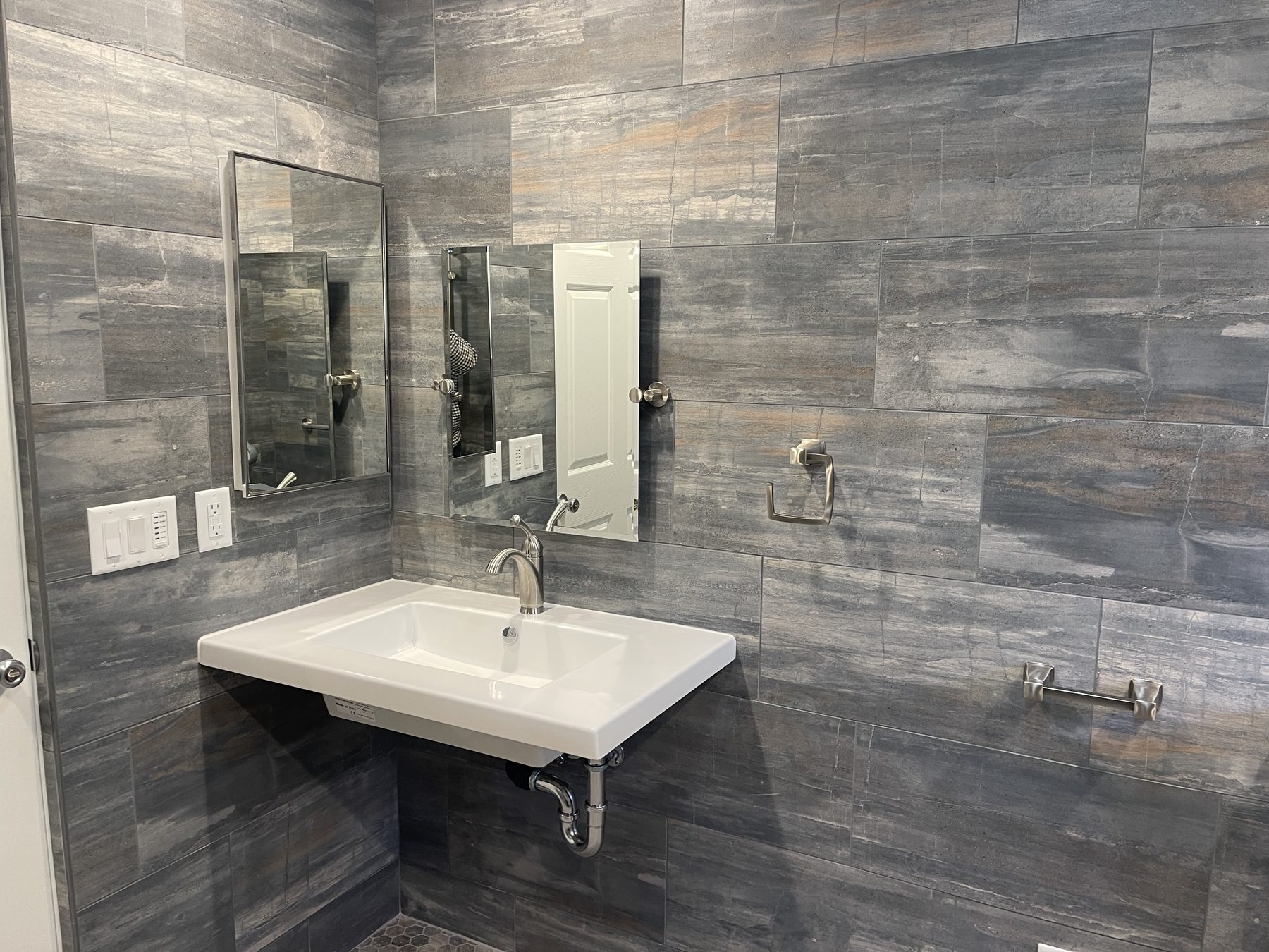 Bathroom remodel with custom tile and walk-in shower