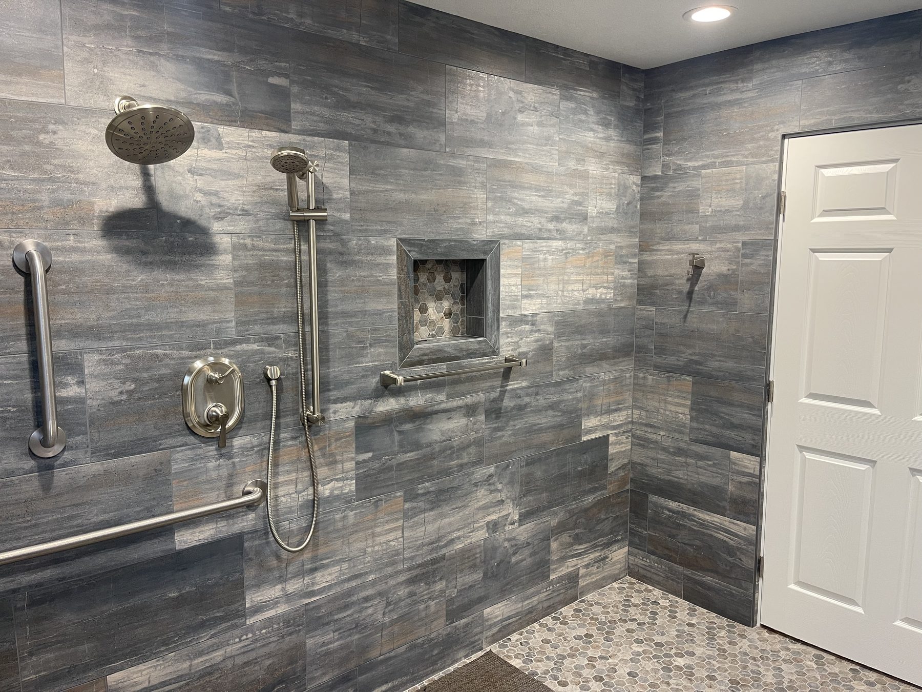 Completed bathroom remodel by Steadfast Design Builders