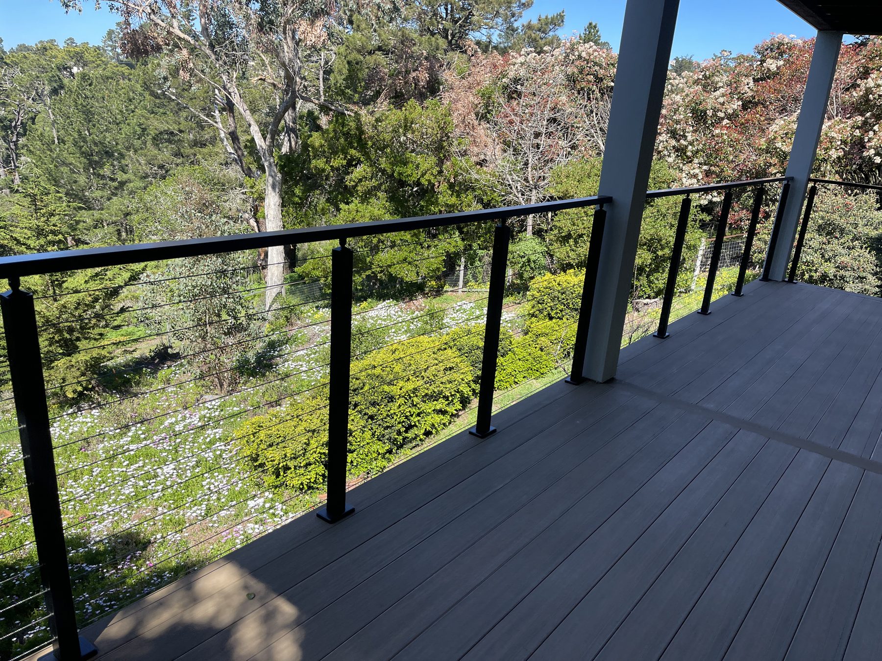 Composite deck with cable railing in Monterey County